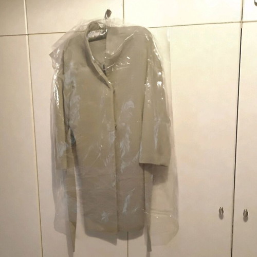 Women's coat H&M like new, pistachio color with belt