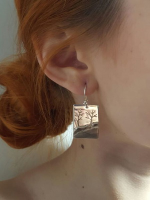 Handmade silver 950 earrings with pierced design and oxidation, new