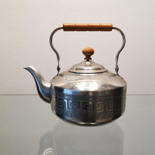 Teapot used with wooden handle and meander pattern