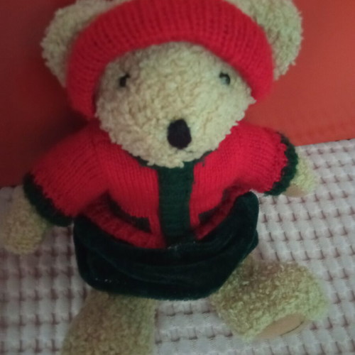 Teddy bear like new, height 23 cm