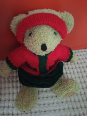 Teddy bear like new, height 23 cm