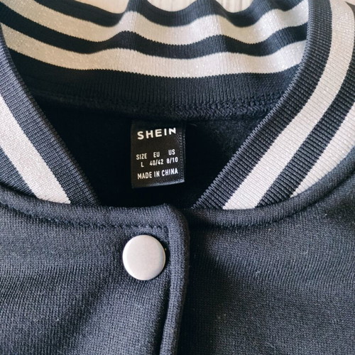 Shein jacket new, black with leather sleeves