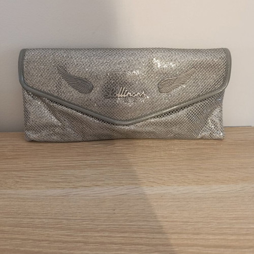 Lollipops bag silver color with decorative wings, like new