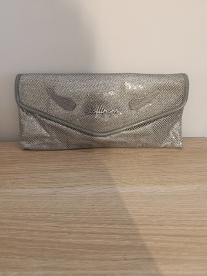 Lollipops bag silver color with decorative wings, like new