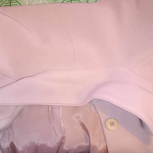 Kanellis Collection soft pink jacket used with wear