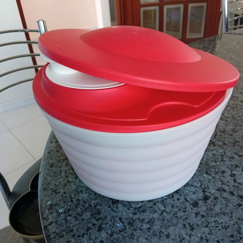 Tupperware container like new with two lids and strainer