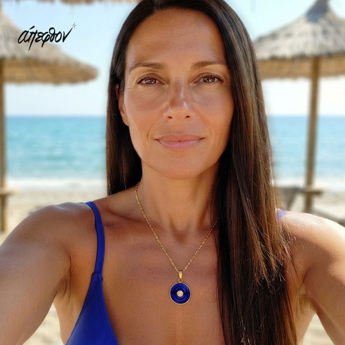 "Bleu Céleste" stainless steel handmade necklace in gold color with blue enamel.