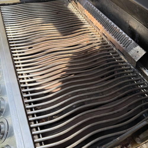 Napoleon Prestige Pro 665 gas grill used with hood and rotisserie