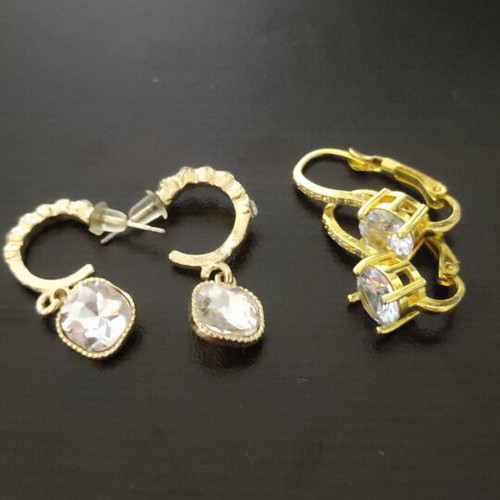 Earrings set like new, 2 pairs gold color with stones