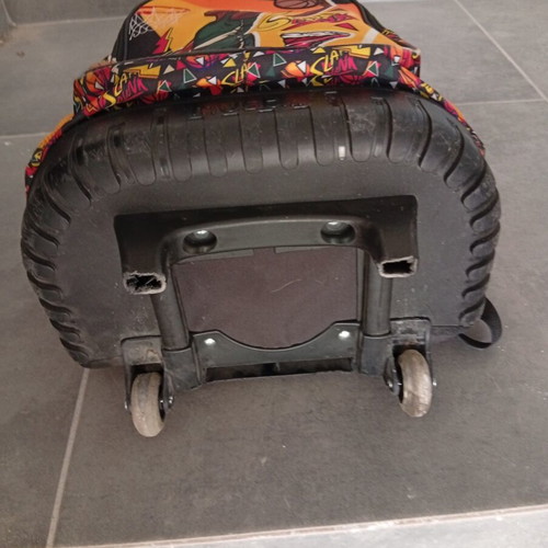 Must school backpack with wheels used, polyester