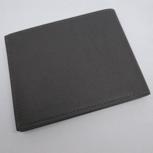 Hermes wallet like new, brown leather with silk lining