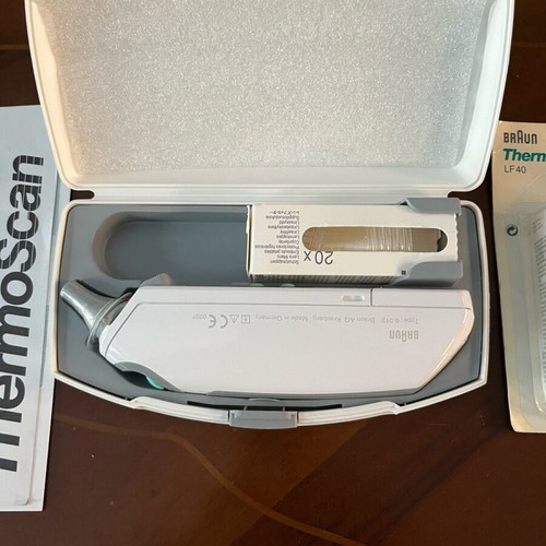 Brown electronic ear thermometer new with two sets of covers