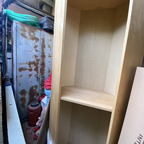 Polygonal beech-colored bookcase used, adjustable shelves