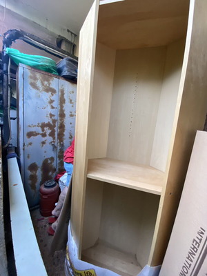 Polygonal beech-colored bookcase used, adjustable shelves