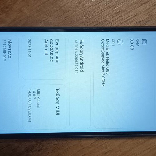 Redmi 12C smartphone used with gift headphones, dual SIM, 32GB