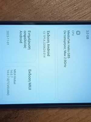Redmi 12C smartphone used with gift headphones, dual SIM, 32GB