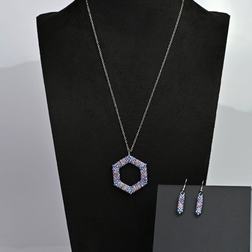 Custom-made jewelry set in light blue tones with hexagonal pendant
