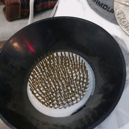 Plastic small with spikes for plastic plants in like new condition