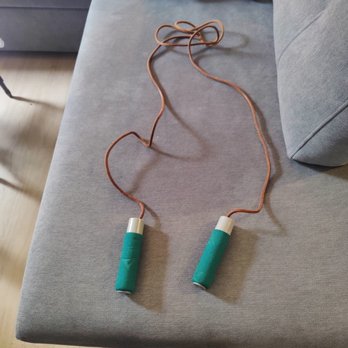 Jump rope with leather strap and weights used