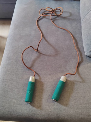 Jump rope with leather strap and weights used