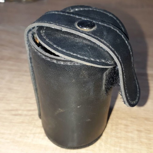 Olmeca leather case and four used shot glasses