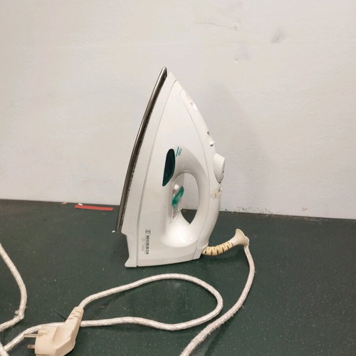 Handheld steam iron used