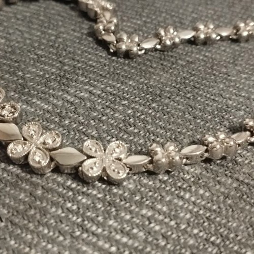 Riviera necklace with flower and four-leaf motifs, silver