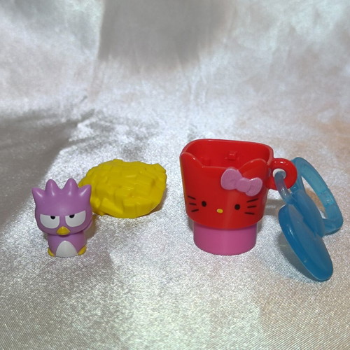 Hello Kitty & Badtz-Maru stamp with fries design, purple