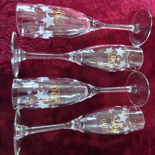 Millennium 2000 champagne glasses set of 4, collectible