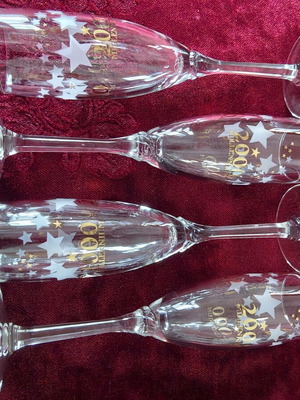 Millennium 2000 champagne glasses set of 4, collectible