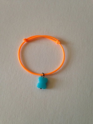 Bracelet used orange with blue bead