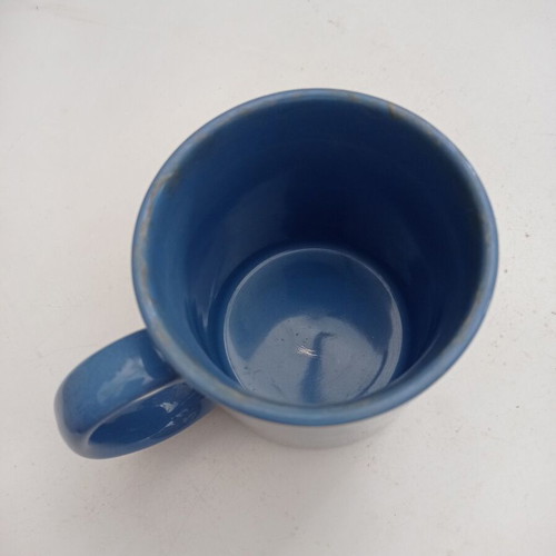 Mug cup with embossed nose face used