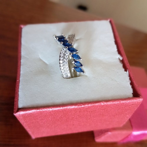 Ring new, gold plated with blue and silver zircon stones, size 7