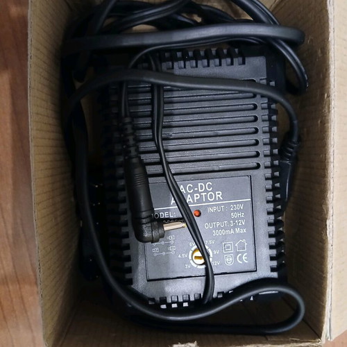 Universal AC/DC adapter new, adjustable power supply with multiple plugs