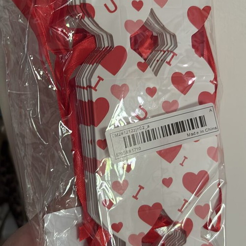 Craft supplies like new, boxes, stickers, decorative flowers and shells