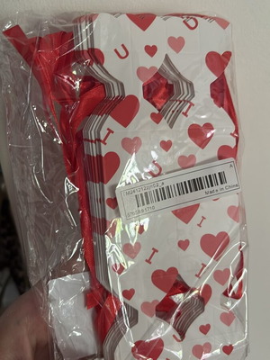 Craft supplies like new, boxes, stickers, decorative flowers and shells