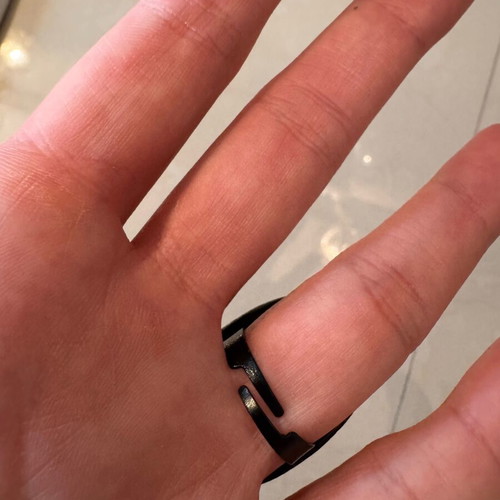 Rings set of 4 like new, black and silver