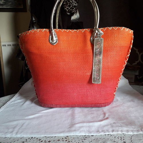 Victoria's Secret straw bag used in gradient shades