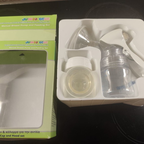 Manual Breast Pump with Bottle Set like new