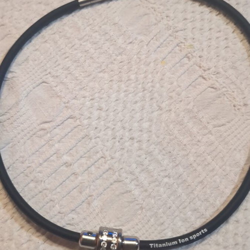 Titanium Ion Sports necklace like new, black and silver