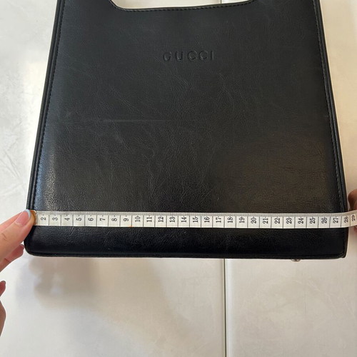 Black shoulder bag used with surface scratch