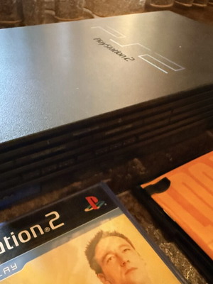 PlayStation 2 Fat console like new with controllers, memory cards, and games