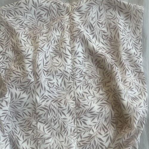 Regalinas sleeveless jumpsuit used, white with leaf print, sizes S/M