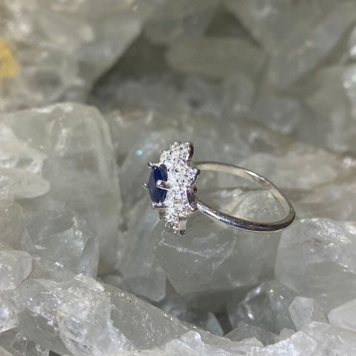 Handmade silver ring with natural blue sapphire and moissanites