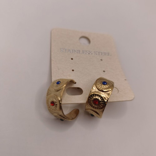 Wide stainless steel hoop earrings with embossed suns and colored crystals