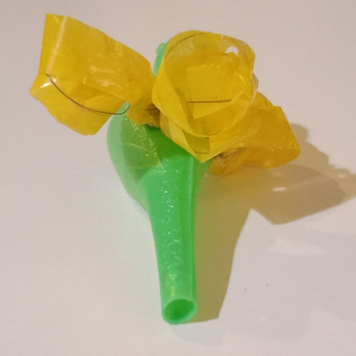 Plastic bird-shaped whistle used, green color