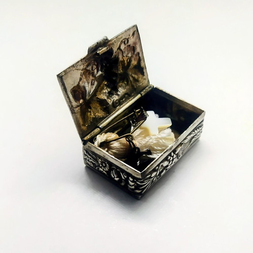 Old silver-plated pill box with embossed decoration like new