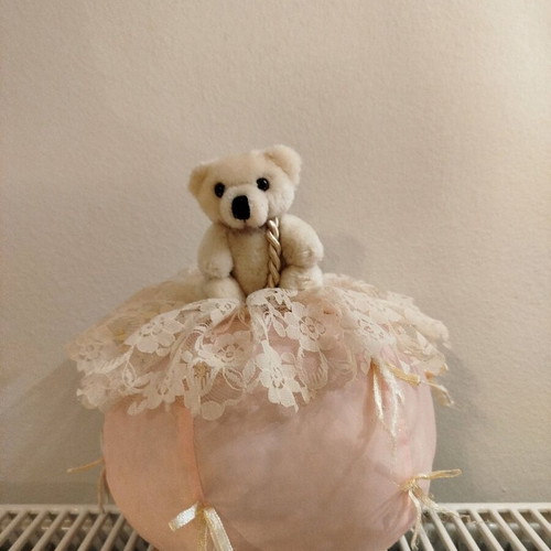 Stuffed bear on ball like new