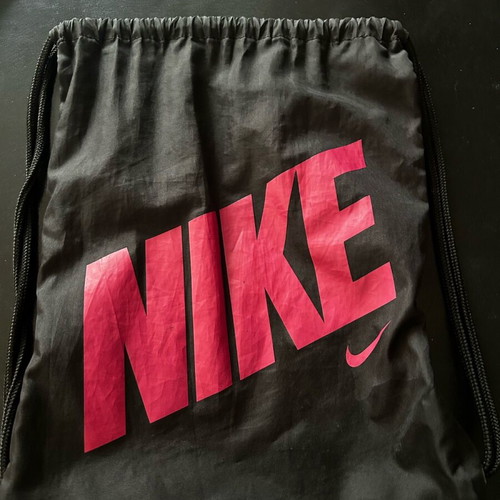 Nike backpack like new with fuchsia print black and pink