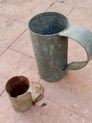 Vintage metal water and oil measuring cups used, set of two